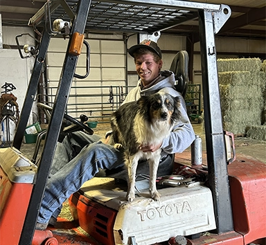 Rockin' Rs Animal Feed Store dog tractor and worker